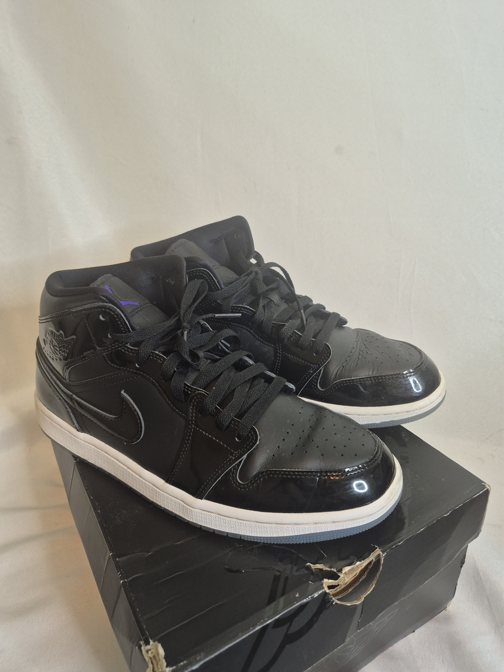 Air Jordan 1 Mid  Sneakers with White Midsole and Subtle Purple Accent